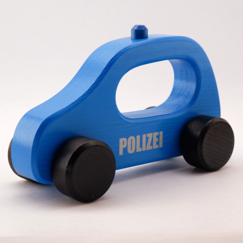 blau lackiertes Griffloch-Polizei Auto mit Blaulicht und mit der Aufschrift "Polizei" leicht seitlich